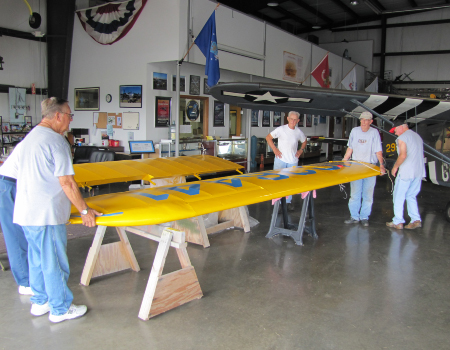 Wing being fitted during final assembly